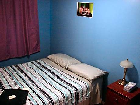 Queen Room with Shared Bathroom