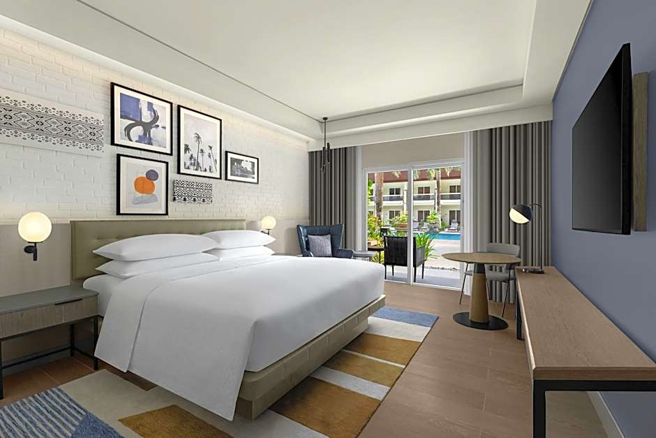 Photo 1 of 2 of Superior 1 King Bed Guestroom, Pool View, Balcony
