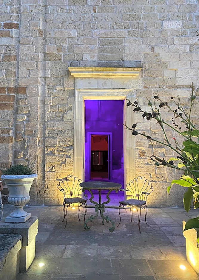 Palazzo de Carlo e il parco dei 7 pozzi