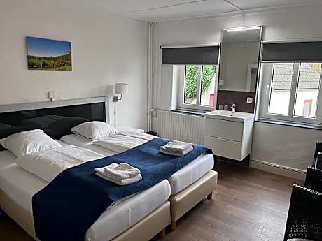 Basic Room with Shared Bathroom (1-2 Adults)