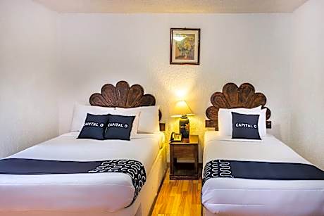 Capital O Hotel Central