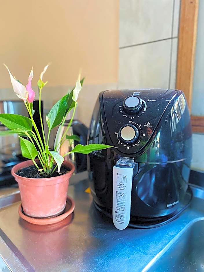 Ambiente ideal para famílias, casa conjulgada com Wi-Fi rápido, cozinha exclusiva e equipada, varanda com churrasqueira - A apenas 1 km da praia e 5 km da charmosa Praia da Vila