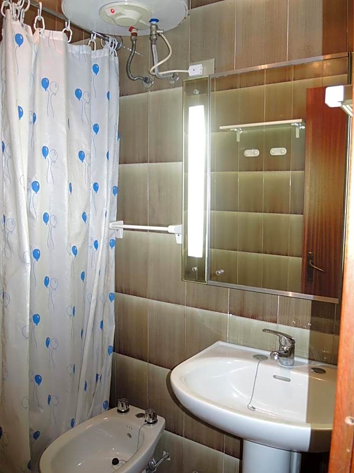 Warm two-room flat with terrace near the beach