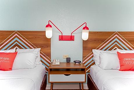 Queen Suite with Two Queen Beds and Partial Ocean View