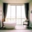 White Wall Riverfront Hotel