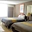 APM Inn & Suites