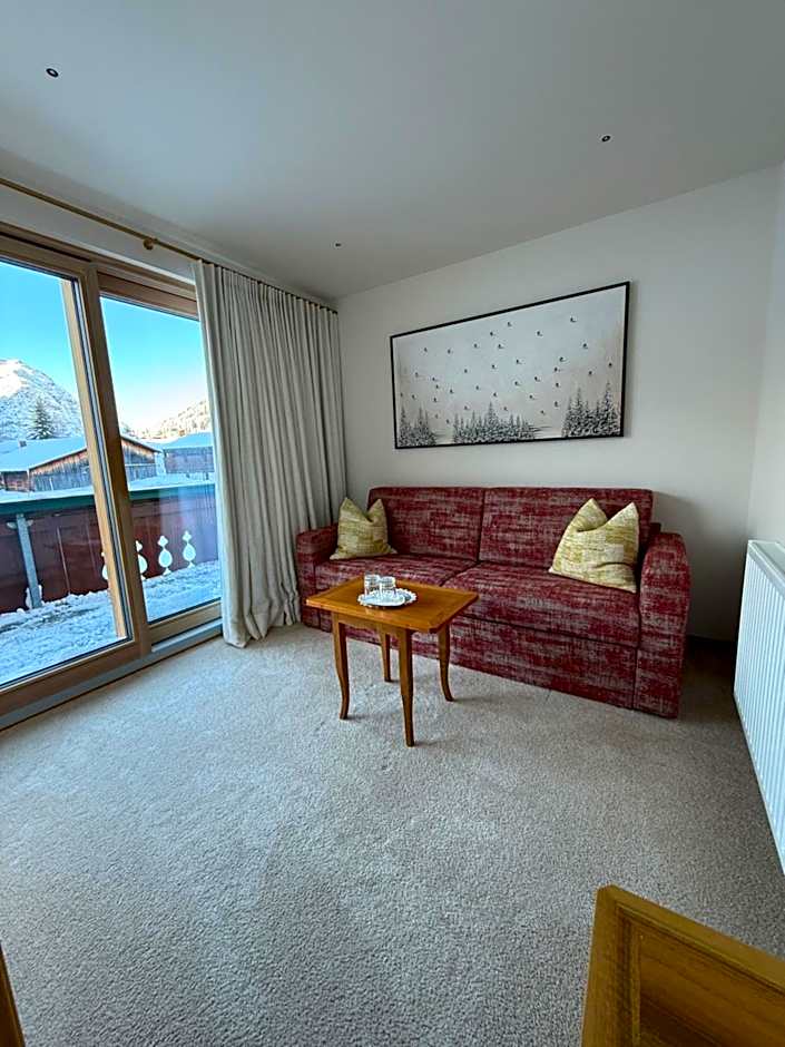 Alpenland - fein & klein, zentral und ruhig mit modernem Wellnessbereich