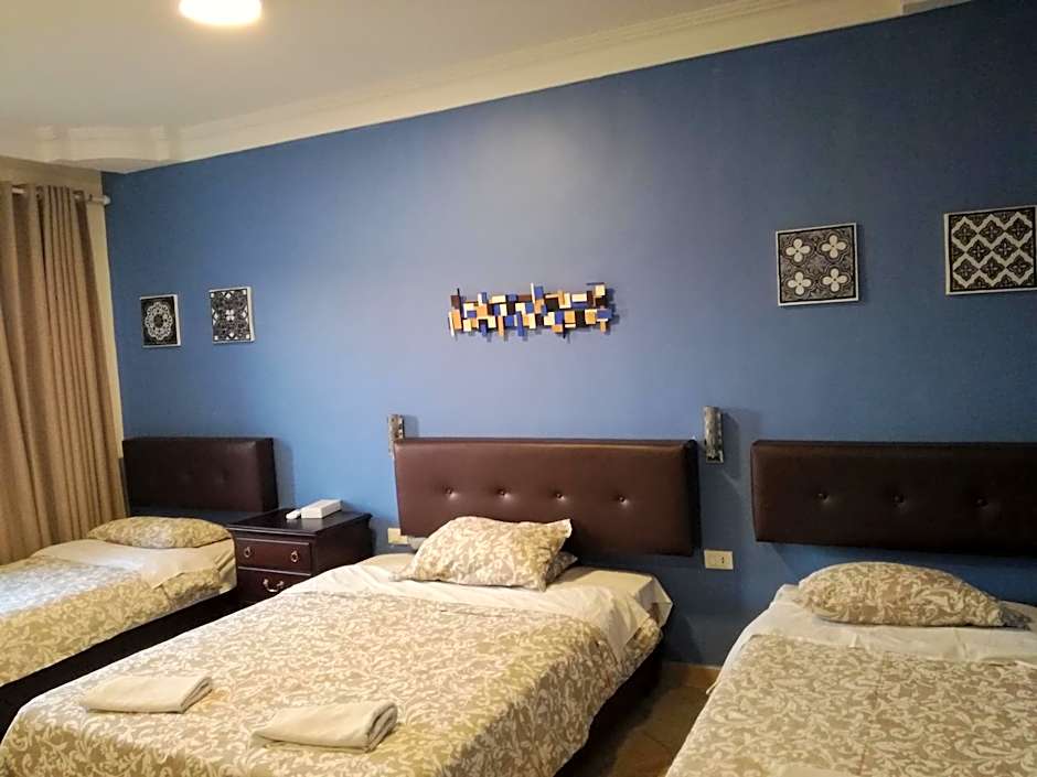 Photo 1 of 21 of Triple Room