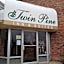 Twin Pine Inn & Suites