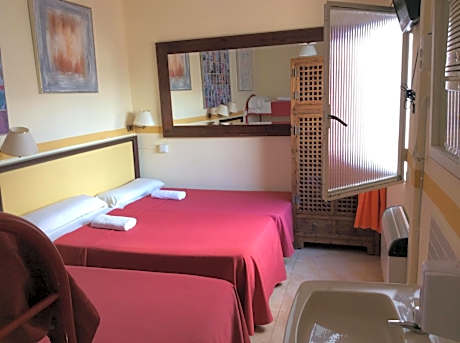 Quadruple Room with Shared Bathroom