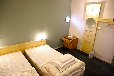  Twin Room with Shared Shower and Toilet