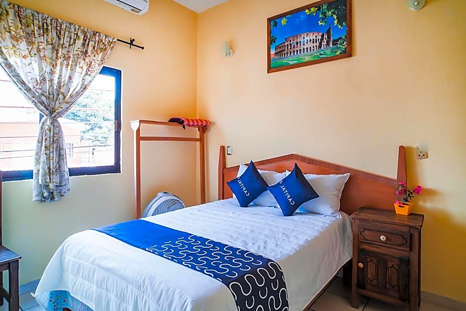 Capital O Hotel Aurora