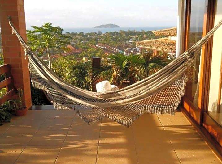 3Suítes, piscina e vista do mar em condomínio pé na areia - pátio compartilhado