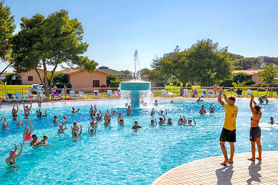 Village with swimming-pool and private equipped beach in Montalto Marina