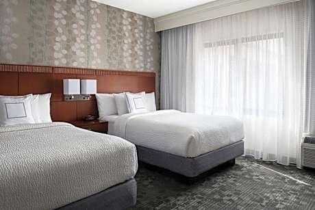 One-Bedroom Double Suite with Two Double Beds, Courtyard View and Sofa Bed