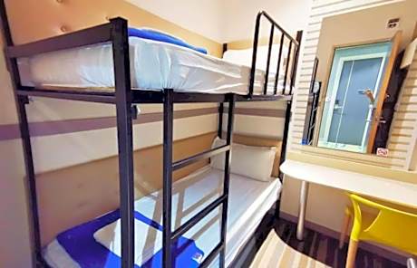 Single Bed in Dormitory Room