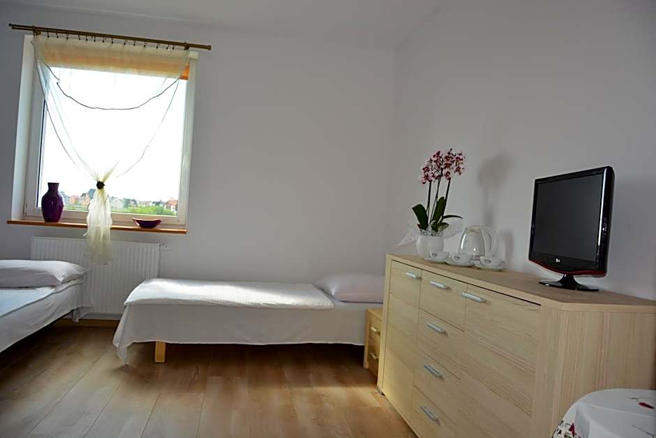 Słoneczny Dom pokoje i apartament na wynajem