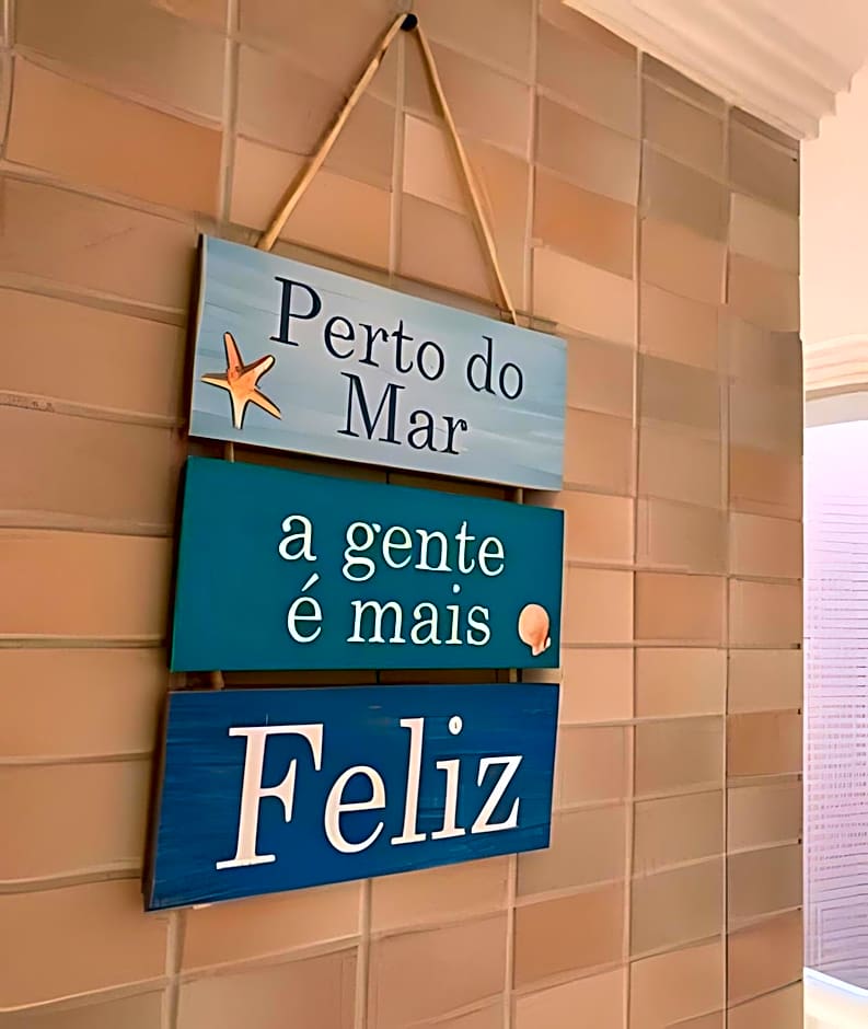 Apartamentos aconchegantes frente mar