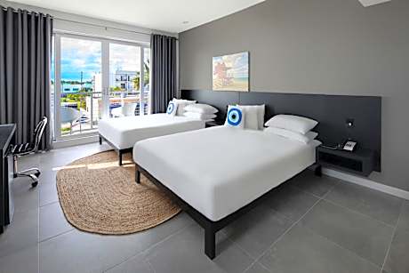 Junior Suite with Two Queen Beds with Balcony and City View - Non-Smoking