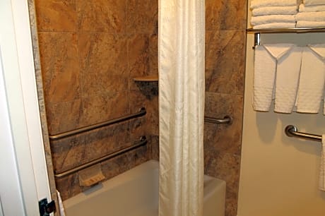 Suite 1 King 1 Queen Bed Mobility Accessible Comms Assist Bathtub Non-Smoking Continental Breakfast