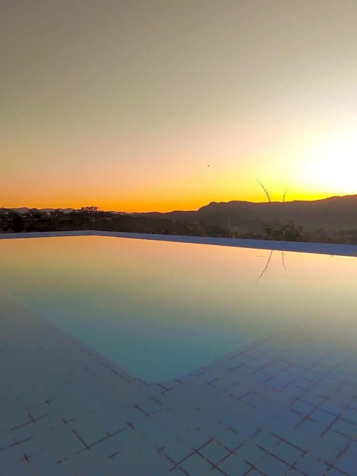 Casa de Maitreya - piscina, ar condicionado