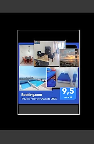 Prédio com piscina na cobertura frente ao mar, apartamento para até 6 pessoas e 3 crianças até 8 anos, churrasqueira na sacada, Wi-Fi grátis, NÃO oferecemos roupas de cama e banho, 1 vaga de garagem, na Praia Grande-Vila Mirim