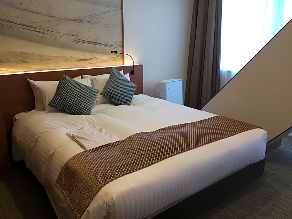 Odysis Suites Osaka Airport Hotel