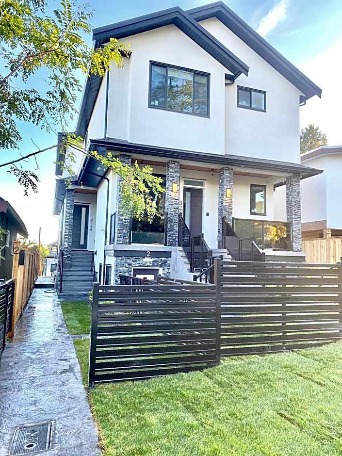 Modern and New house near PNE with Big Garden and Free Parking
