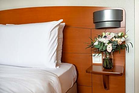 Triple Room (1 Double Bed + 1 Single Bed)