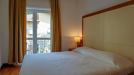 Connecting Family Suite with Balcony and City View