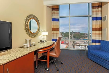 1 KING DELUXE MOBILITY ACCESSIBLE W/ RI SHWR, 55 IN TV-CRABTREE AND EVELYN BATH AMENITIES, SERENITY BED-LUX LINENS