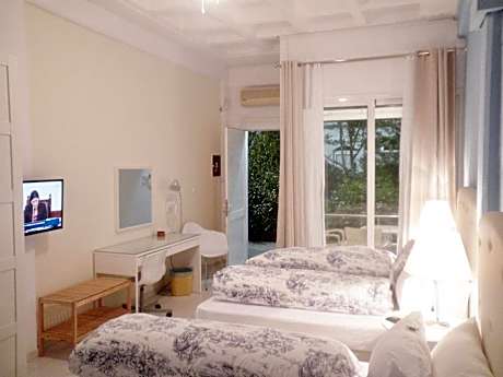 Triple bed studio with garden view
