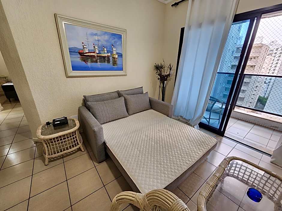 Lindo Flat Capitania Varam , WI FI , 2 aparelhos de ar condicionado , serviço de praia , enorme sacada com vista ao mar e telas de proteção para as crianças , 3 piscinas