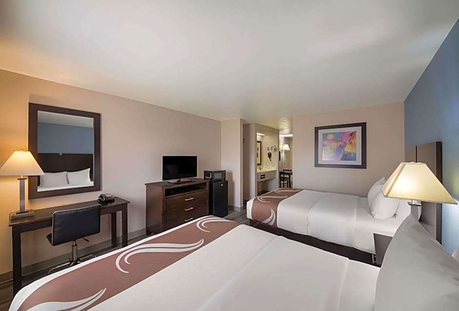 Photo 1 of 7 of 2 Queen Beds with Sofabed Suite