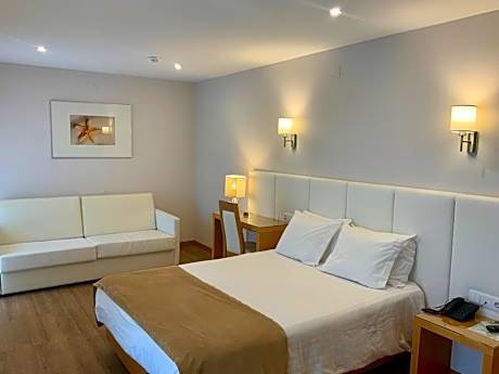 Double Room with Extra Bed (2 Adults + 1 Child)