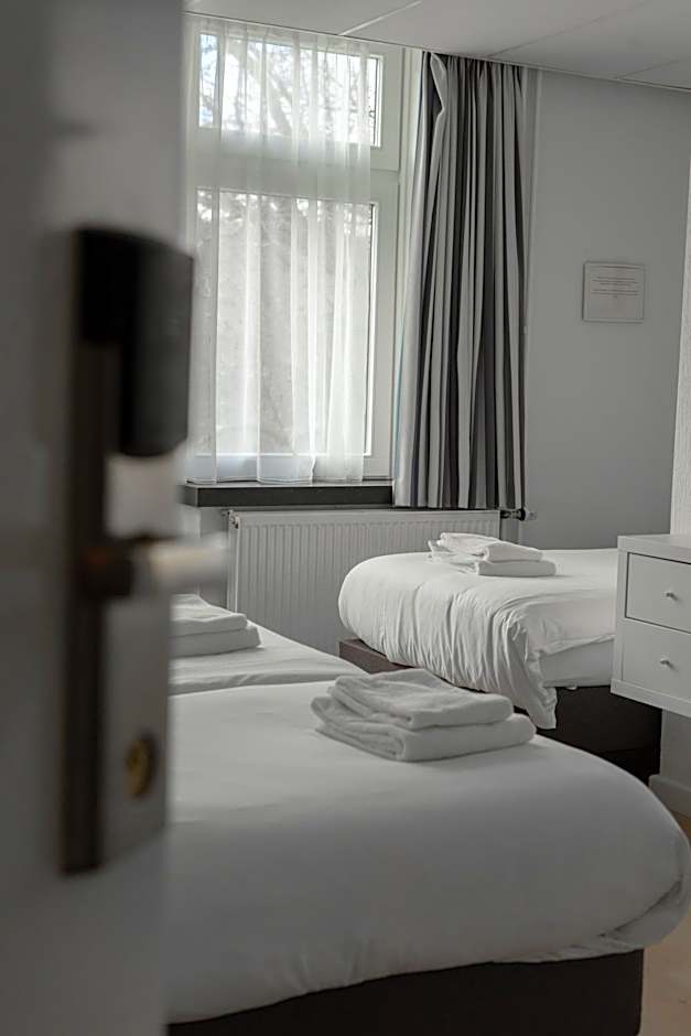 Photo 1 of 2 of Triple Room