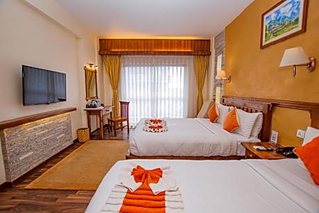 Deluxe Family Room with Private Balcony and Lake or  Mountain View