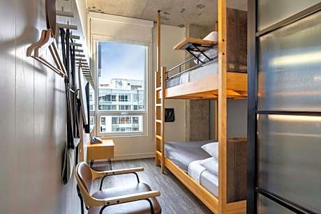 Room with Two Double Bunk Beds - Mobility Accessible with Roll-In Shower