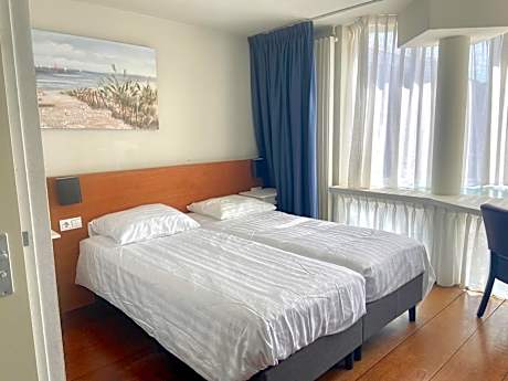 Quadruple Room with Private Bathroom