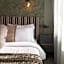 Happy Inn Rooms & Suites