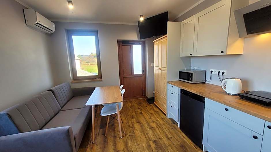 Wrzosowe Wzgórze 5 - Studia i Apartamenty