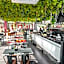 G Suites Hotel By AMITHYA