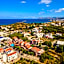 Theos Village Apartments
