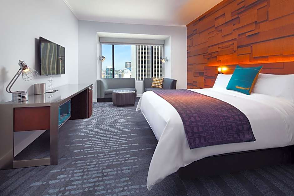 Photo 1 of 5 of Deluxe 1 King Bed Guestroom, Partial Water View
