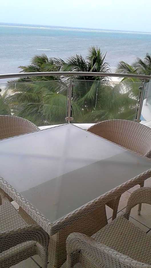 Cowrie Shell Beach Apartments Official
