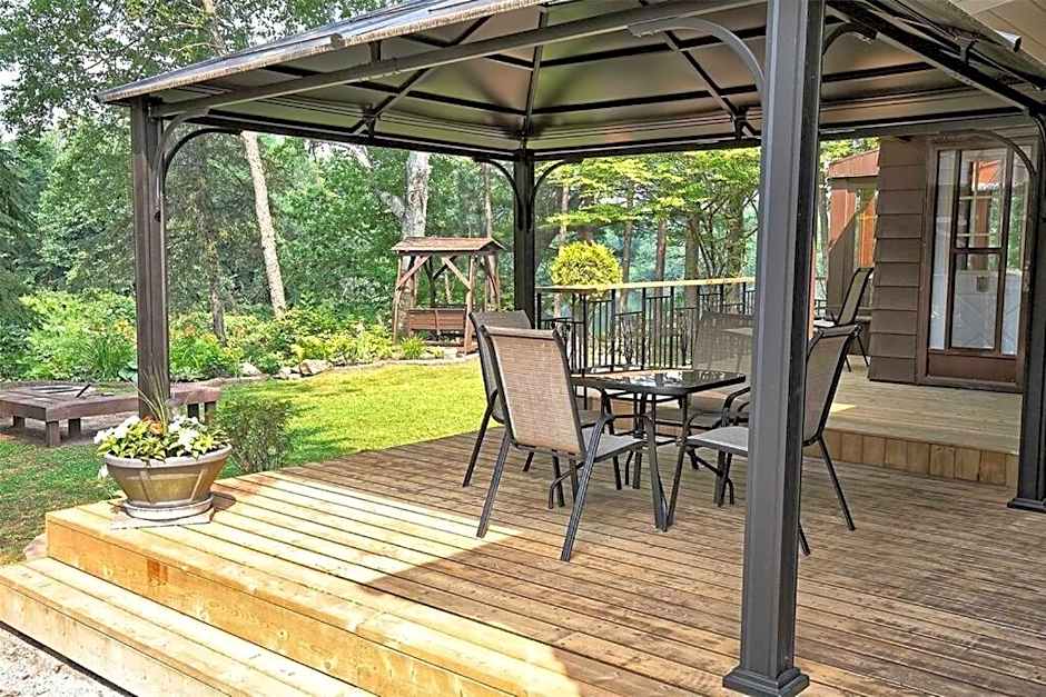 Whispering Pines Riverside Retreat