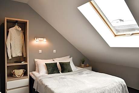 Deluxe Two-Bedroom Apartment with Balcony and air conditioning in the Attic