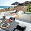 Mnḗmē Suites & Villas