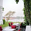 White Wall Riverfront Hotel