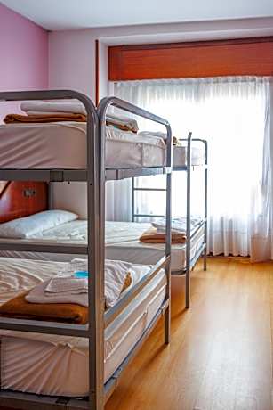 Habitación Doble con litera y baño privado